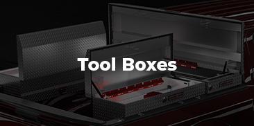 A silver Weather Guard tool box, and two more Weather Guard tool boxes.