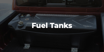 A transfer fuel tank, installed in a truck.