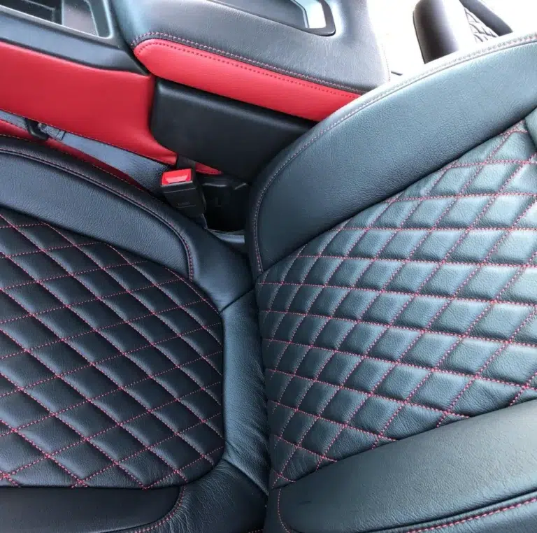 A closeup of a custom leather interior, upgraded by a Katzkin installer.